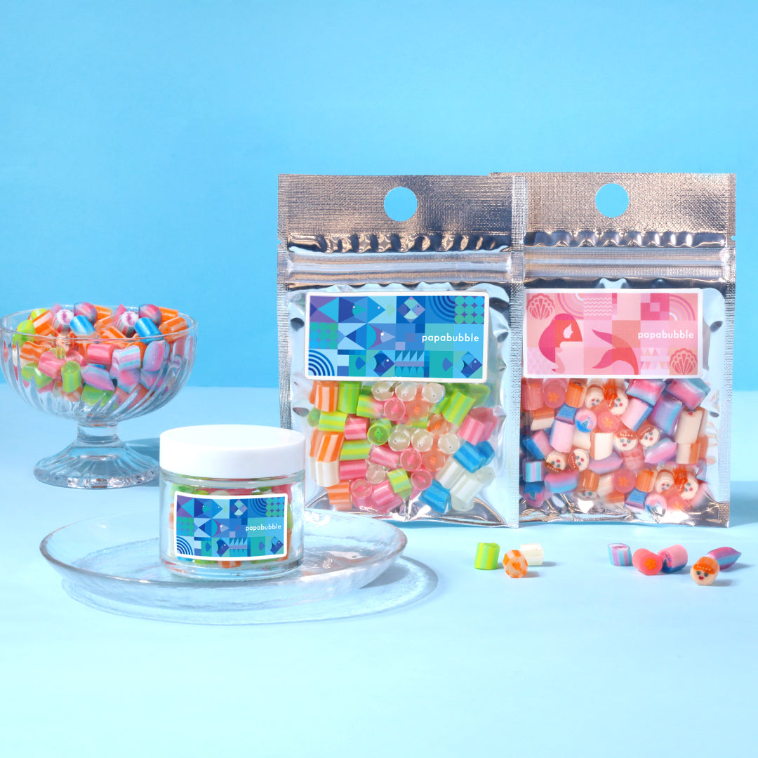 光に透かすとまるで海！夏の海がそのままキャンディに。新味トロピカルティー＆シトラスプラムも登場！PAPABUBBLEのSEAシリーズ　8月6日より発売